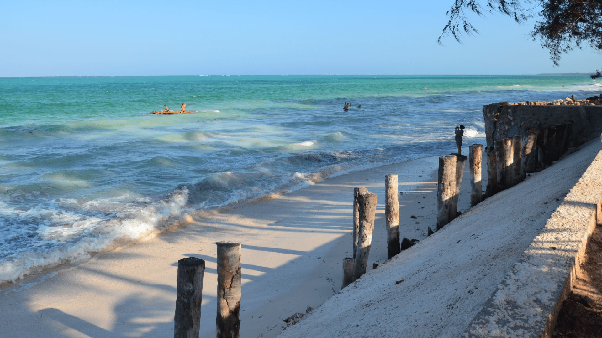 The white sandy beaches of Zanzibar being lapped by clear, turquoise water captured by Annelieke Huijgens