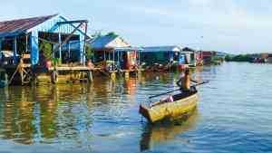 Bright coloured boats on Tonle Sap Lake on a Cambodia tour
