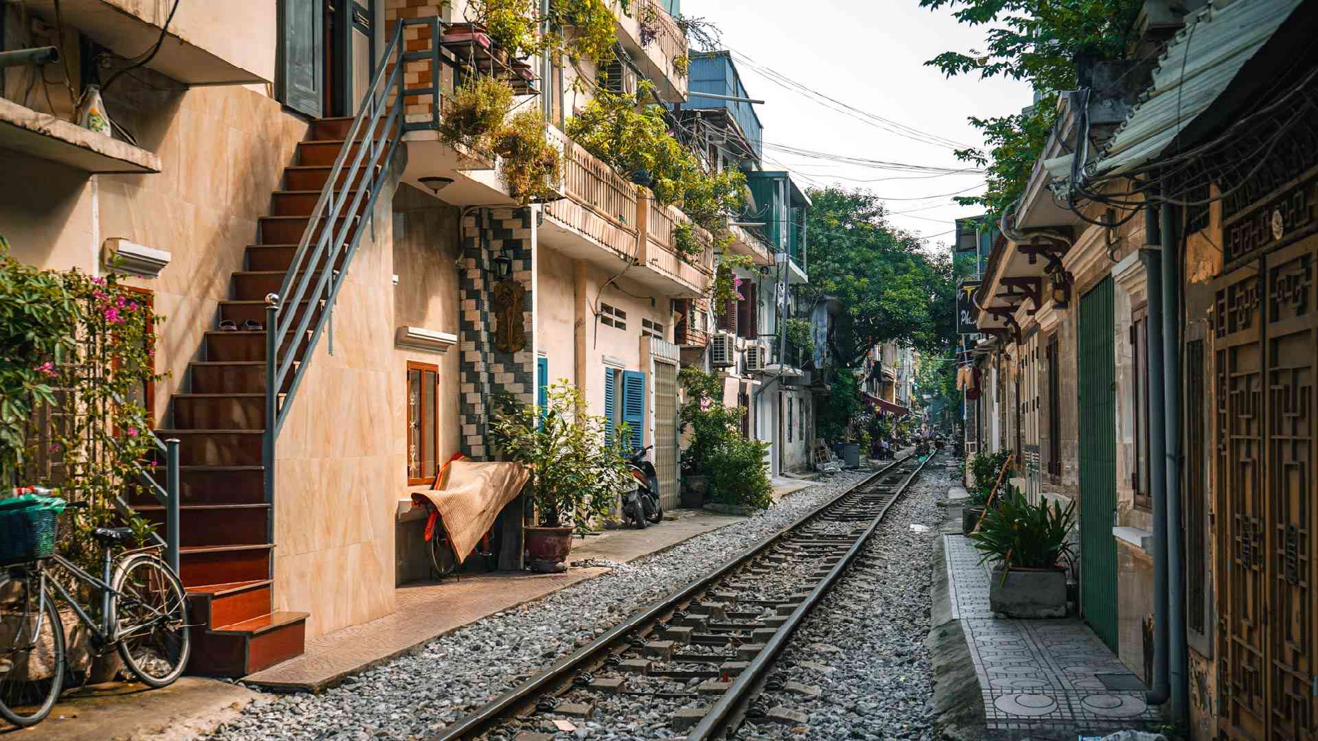 Rail tracks in Hanoi between houses on a Vietnam tour