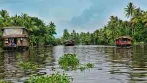 Houseboat on a body of water in Kerala Backwaters, India