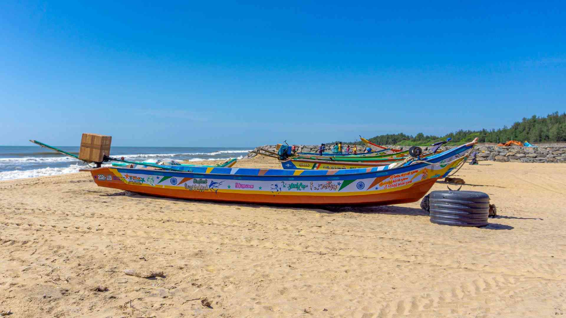Colourful boat on the beach in Kokilamedu Village, Mahabalipuram, India