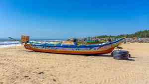 Colourful boat on the beach in Kokilamedu Village, Mahabalipuram, India