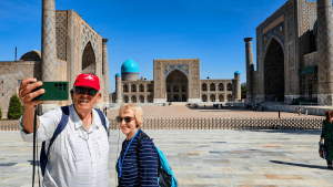 Two Bunnik Tours travellers in front of Samarkand in Uzbekistan by Dennis Bunnik