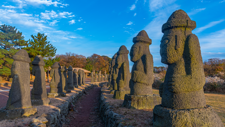 Statues in Jeju Stone Park at Jeju Island, South Korea by dudlajzov AdobeStock