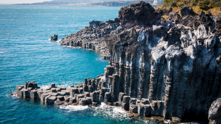 View of Jusangjeolli Cliff, Jeju Island, South Korea by Pradit / AdobeStock
