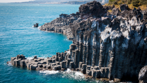 View of Jusangjeolli Cliff, Jeju Island, South Korea by Pradit / AdobeStock
