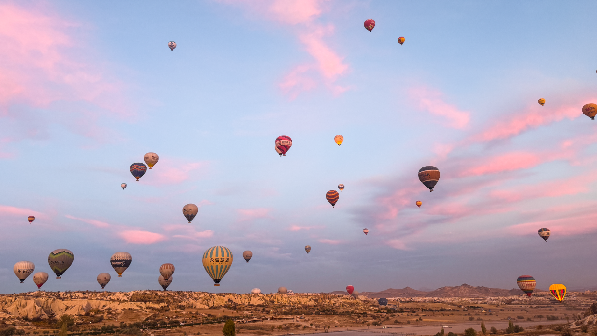 Hot Air Balloons at sunrise in Cappadocia, Türkiye by Zoe Francis