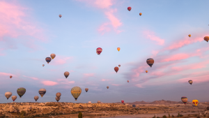Hot Air Balloons at sunrise in Cappadocia, Türkiye by Zoe Francis