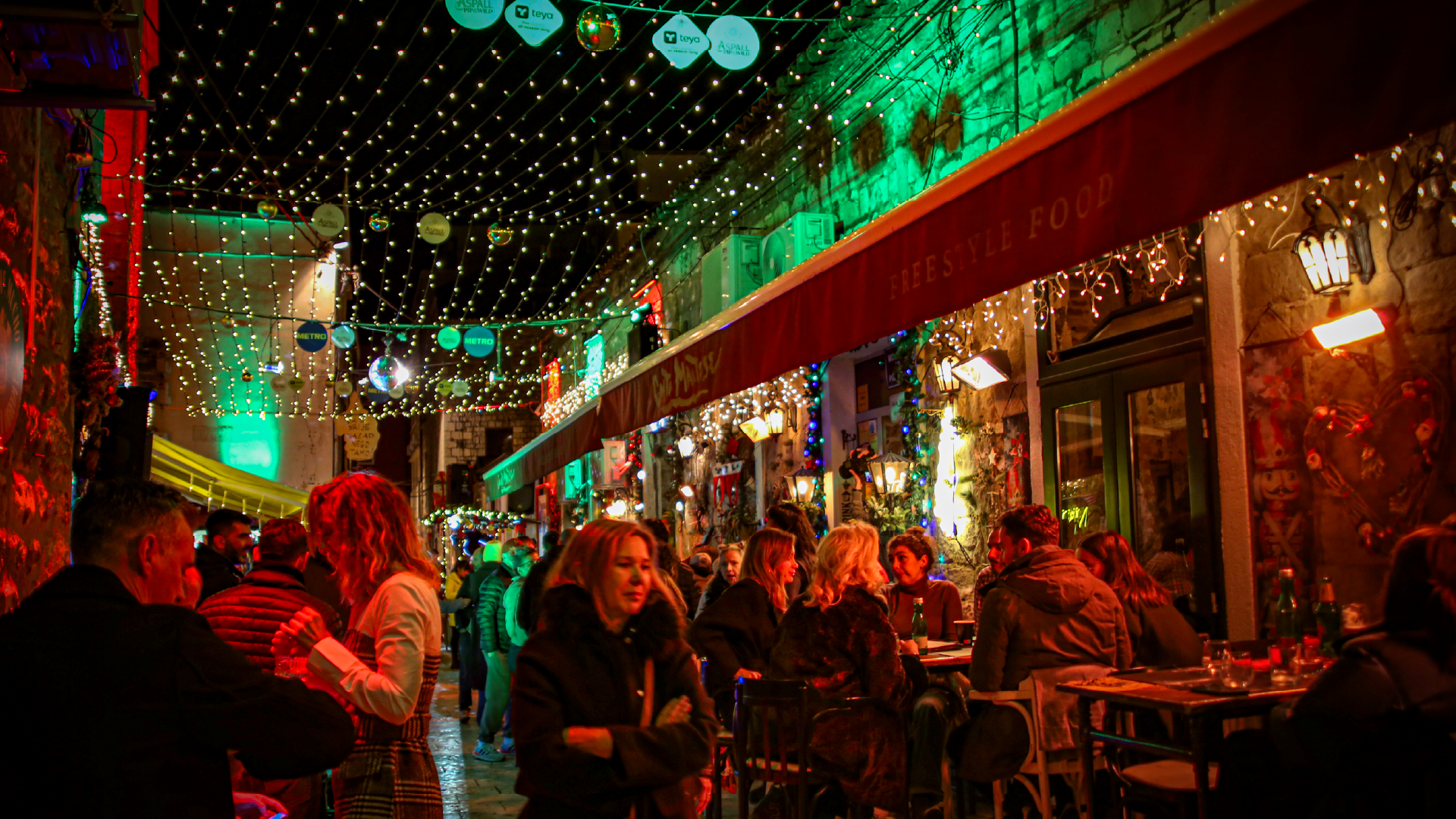 People at the Christmas Markets in Split, Croatia by Hera Sparnon