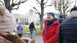 Guide speaking to travellers during a tour at Heldenplatz in Vienna, Austria by Hera Sparnon