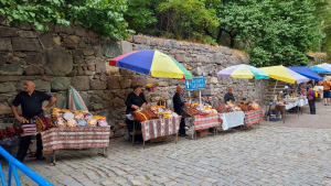 Local food stalls scattered along the streets of Geghard, Armenia captured by Dennis Bunnik