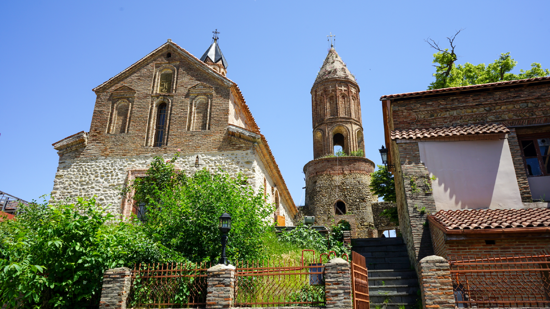 Old brick buildings along the streets of Sighnaghi in Georgia captured by Priscilla Aster