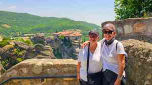Two women standing at Meteora on a Bunnik Tour of Greece
