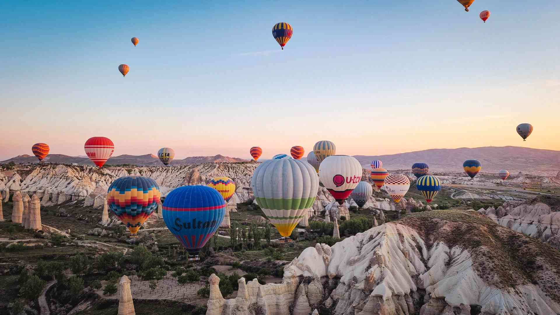 Balloons floating in Cappadocia on a Bunnik Tour of Türkiye and Greece
