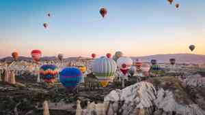 Balloons floating in Cappadocia on a Bunnik Tour of Türkiye and Greece
