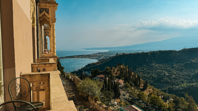 View of the coast from a balcony in Taormina, Sicily, Italy by Nicky Bevan