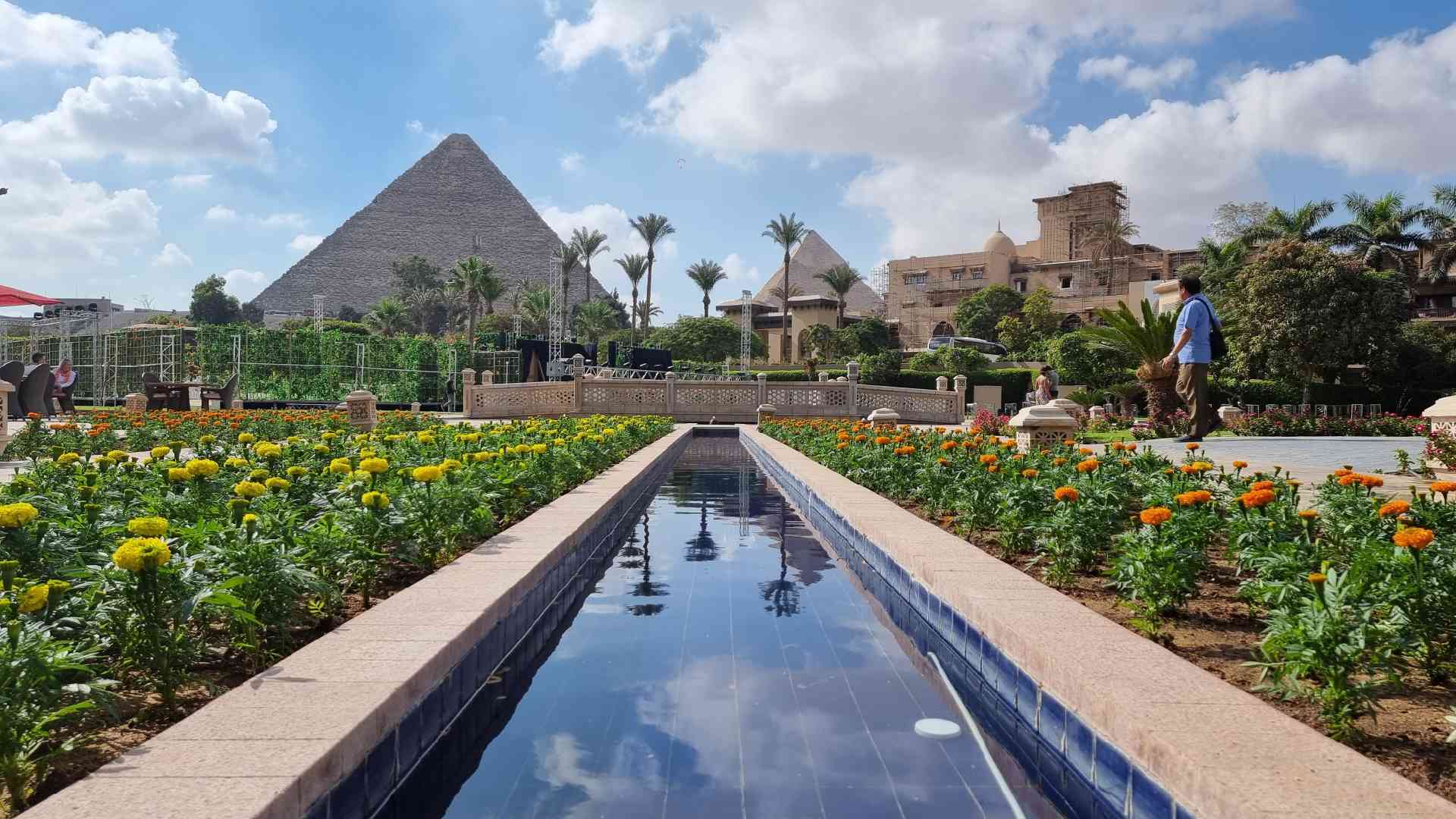 Lunch overlooking the pyramids in Egypt by Dennis Bunnik