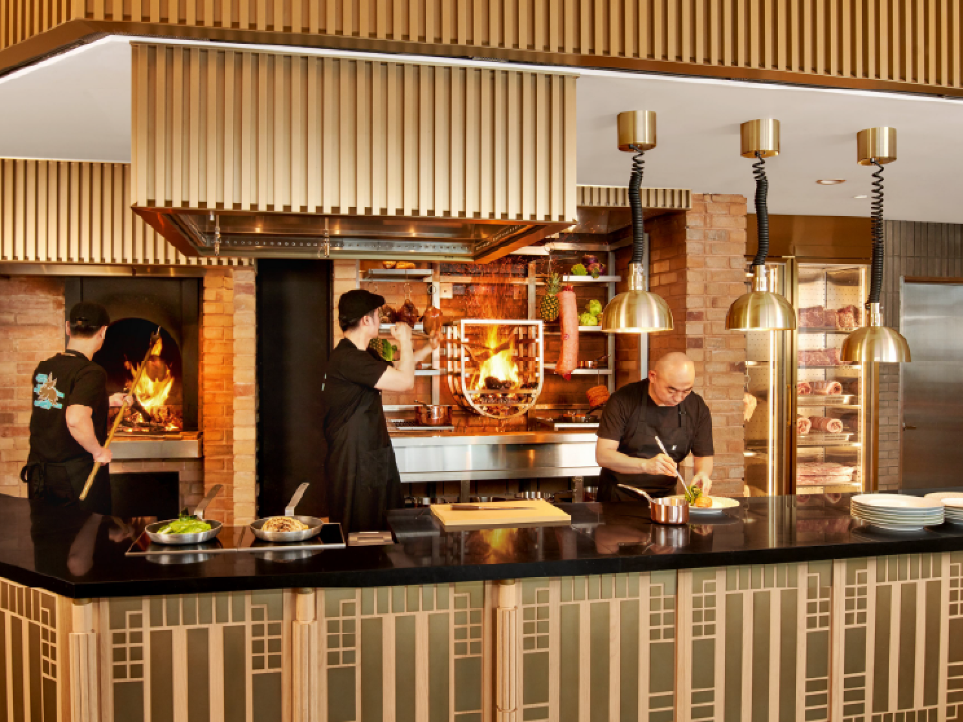 View of People working in the kitchen at The Flying Hog Restuarant on Jeju Island, South Korea