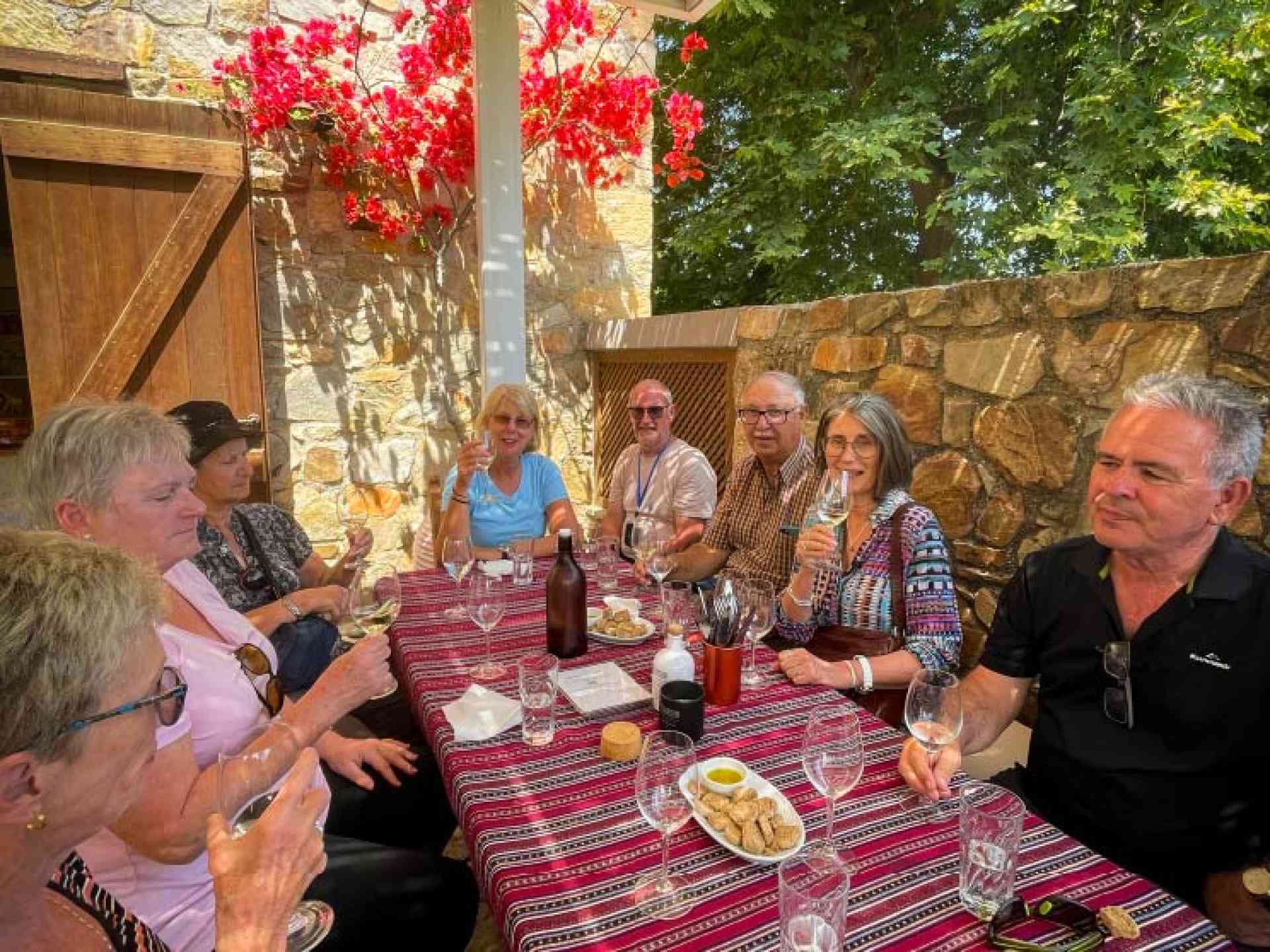 A group of travellers having lunch in Crete, Greece on a Bunnik Tour
